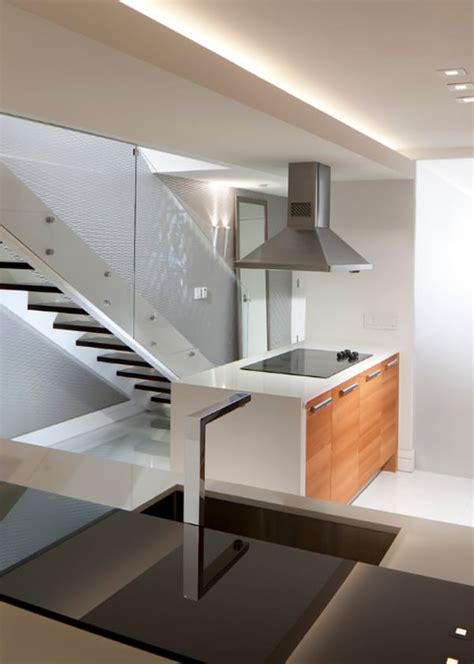 Let me answer that and tell you that not many people figured this out. 55 Amazing space-saving kitchens under the stairs