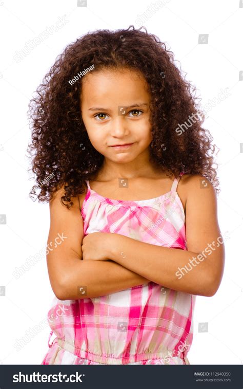 Portrait Of Pretty African American Mixed Race Child Against White
