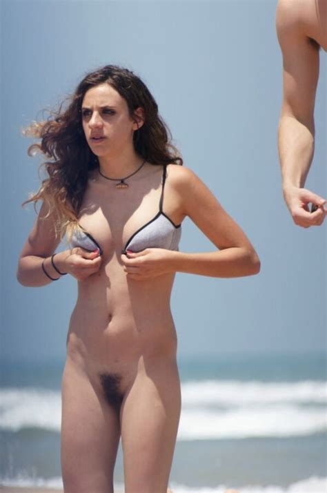 Sexy Italian Chick Bottomless On Nude Beach 21 Pics