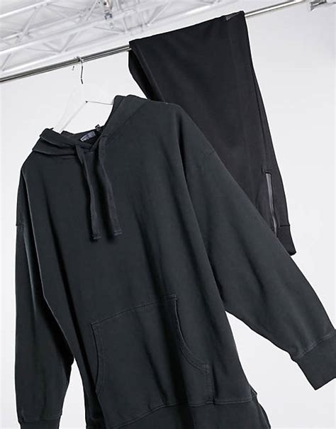 Asos Design Oversized Panelled Hoodie In Washed Black Asos
