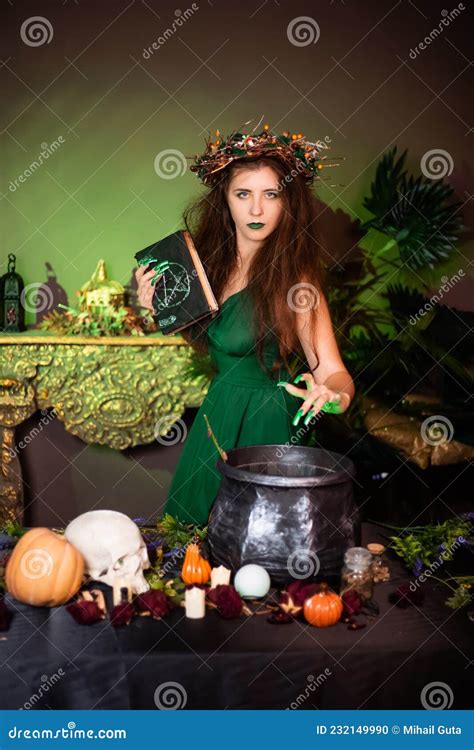 witch with disheveled hair and long nails with a wreath of dry branches on her head dressed in