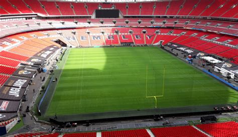 Time lapse movie over several years following the demolition and rebuilding of wembley stadium, england's national football and other sports venue. NFL: Das Wembley Stadion vor dem International Game