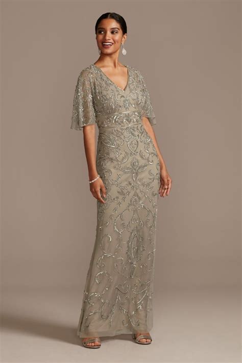 Beaded Mesh Overlay Gown With Flutter Sleeves Davids Bridal In 2021
