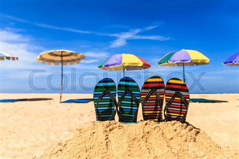 Flip Flops On The Sandy Beach With Blue Stock Image Colourbox