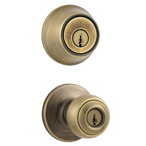 Kwikset Tylo Antique Brass Keyed Entry Door Knob In The Door Knobs
