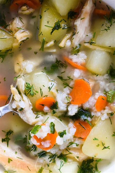 When cool enough to handle, remove meat from bones; Easy Chicken and Rice Soup - Olga in the Kitchen