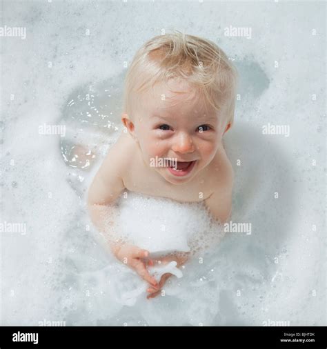Baby Having A Bubble Bath Stock Photo Alamy
