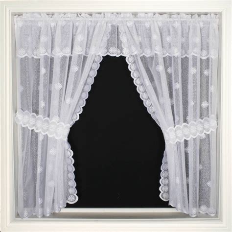 If you have decided to go with a plain looking shade or set of blinds, but still want to add some design elements to your windows, valances are an ideal. DALLAS WINDOW SET: priced per curtain - Net Curtain 2 Curtains