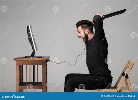 Angry Man Is Destroying A Keyboard Stock Photo Image Of Anger