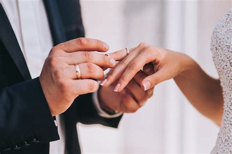 Premium Photo Young Married Couple Holding Hands Ceremony Wedding Day