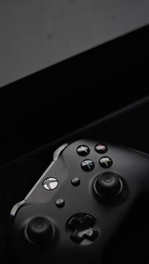 Xbox One Controller Beside Three Xbox One Cases · Free Stock Photo