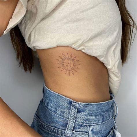FIne Line Sun And Moon Tattoo On The Rib
