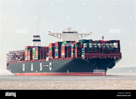 Ultra Large Container Ship Mv Barzan On The Elbe River Near Hamburg