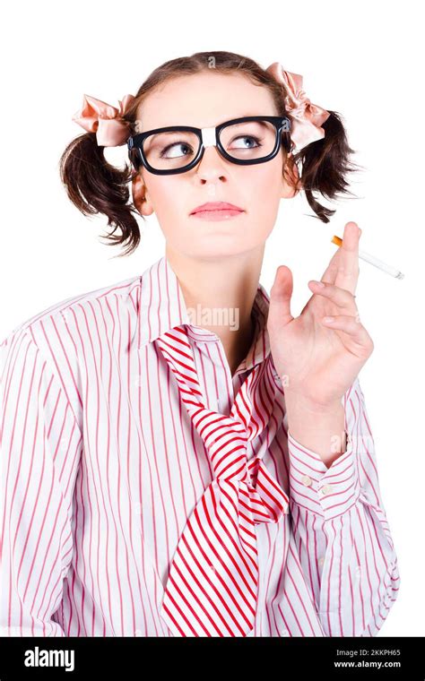 Young Nerdy Girl With Her Hair In Bunches Smoking A Cigarette Stock