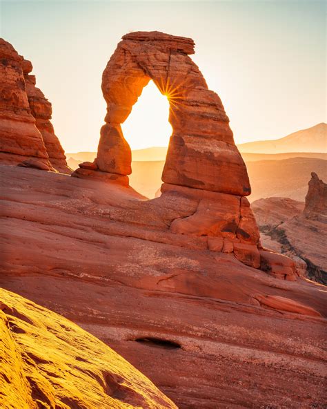 Expose Nature A Delicate Formation Of Red Rocks At Sunrise Arches