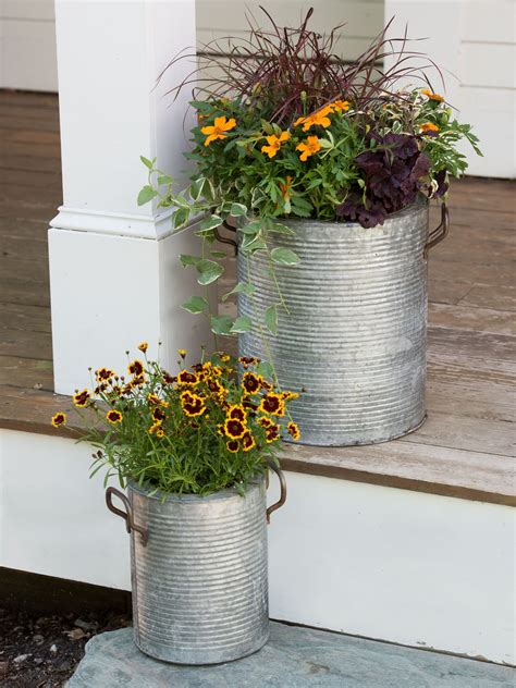 Galvanized Metal Planters With A Rim And Handles