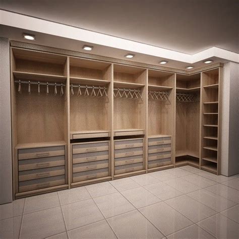 A floating shelf, a beloved chair, a pile of books—even a stack of vintage suitcases. Master Bedroom Closet Design | Sleek Modern Dark Wood ...