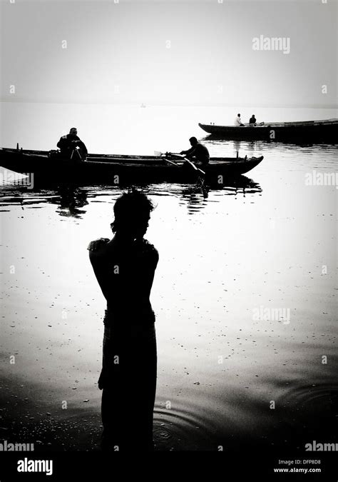 pilgrims bathing at ghat steps on river ganges gats in varanasi banaras uttar pradesh india