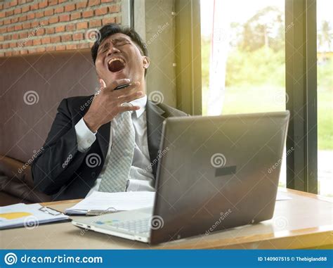 Tired Man Yawning At Workplace In Office Stock Image Image Of Coffee
