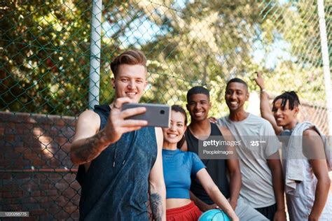 Shot Of A Group Of Sporty Young People Taking Selfies Together Smile Photography Stock
