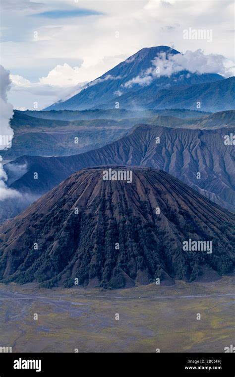 An Elevated View Of Mount Batok Foreground And The Bromo Tengger