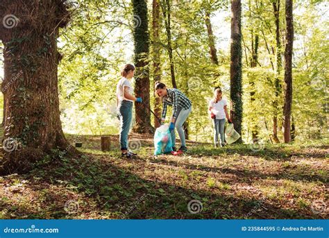 People Cleaning Up The Forest Together Stock Image Image Of