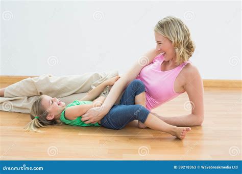 Smiling Pregnant Woman Tickling Young Daughter Stock Image Image Of