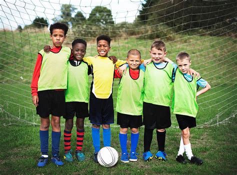 Junior Football Team Standing Together Free Photo Rawpixel