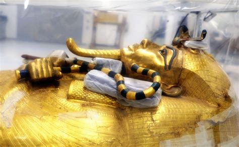 golden touch up king tutankhamun s coffin undergoes first ever restoration at new grand