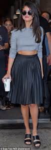 Selena Gomez Flashes Her Stomach In A Crop Top And Pleated Skirt In New