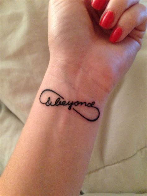A Womans Wrist Tattoo With The Word Everyone Written In Cursive Font