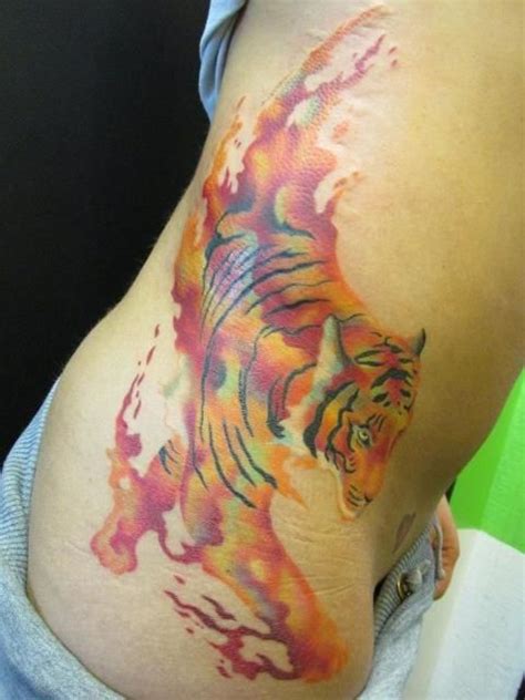 Striped ear dotwork tattoo design. Watercolor Tiger tattoo ... love this | Tiger tattoo ...