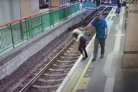 Man Shoves Woman Onto Train Tracks Caught On Video — Ibexclusive