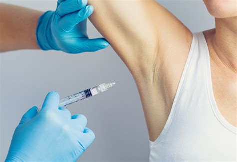 The Doctor Making Intramuscular Injection With Syringe Of Botulinum