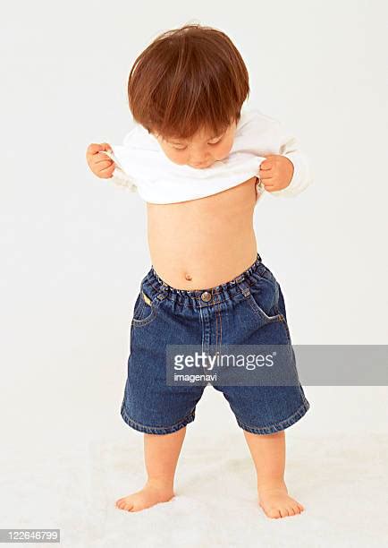 Boy Belly Button Photos And Premium High Res Pictures Getty Images