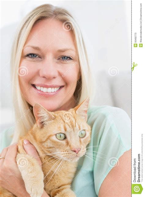 Woman Holding Cat At Home Stock Image Image Of Blonde 50492773