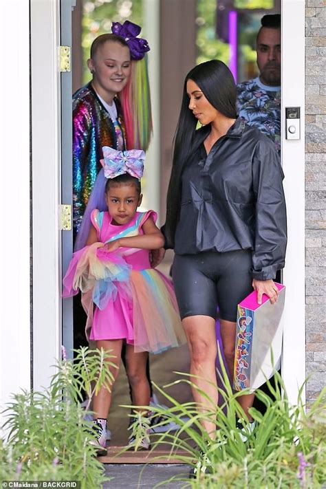 Kim Kardashian S Daughter North West Dresses Up In Rainbow Outfit As She Films
