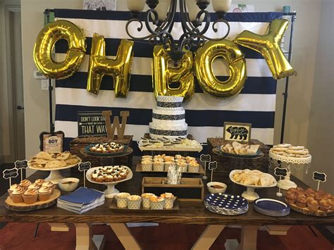 Decorations can breathe fun into the party, make it an elegant soiree or a dreamy afternoon tea; Baby boy shower. Navy, brown and gold! | Nautical baby shower boy, Gold baby shower boy, Baby ...