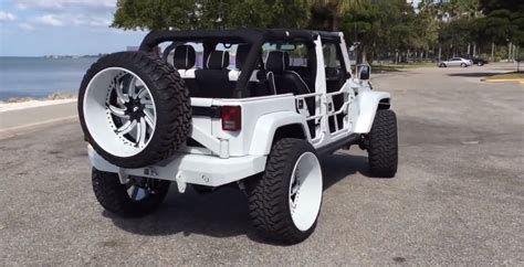 White Jeep Wrangler With Forgiatos And 37 Inch Mud Tires Autoevolution