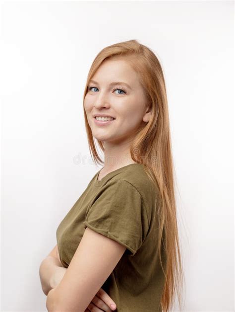 Ginger Female With Long Straight Shiny Hair And Natural Make Up Smiling