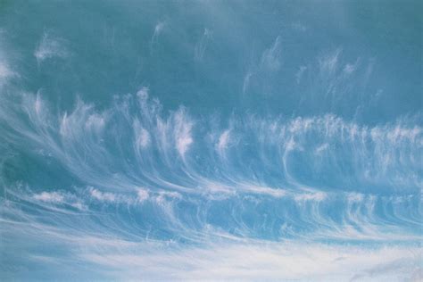 Lines Of Cirrus Cloud Mares Tails In The Sky Photograph By Pekka