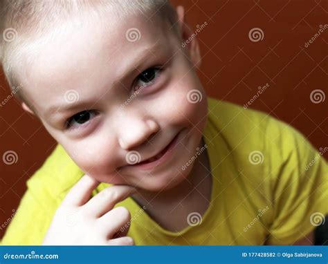Happy 6 Years Old Baby Boy Kid Is Smiling Grinning Stock Photo
