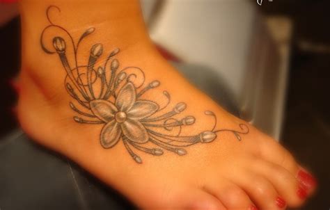 Tiny Flowers Tattoo On Foot