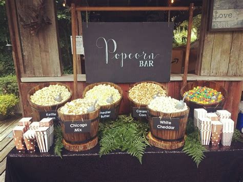 Popcorn Bar With Rose Gold Boxes And A Black Sequin Tablecloth Wedding