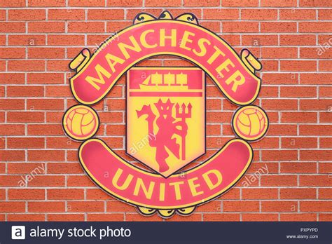 This looks like an email address. Manchester United Badge on a Wall at Old Trafford Stock ...