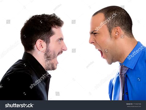 Closeup Portrait Of Two Angry Mad Men Yelling Screaming