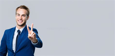 Businessman Showing Victory Gesture Stock Image Image Of