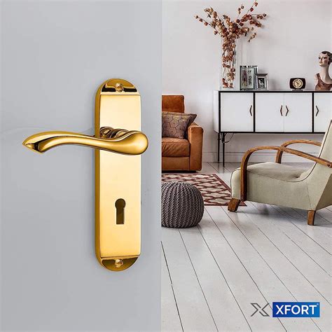 Xfort Cadenza Scroll Polished Brass Door Handles Lock Contemporary