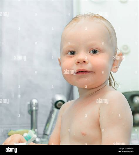 Little Boy In The Shower Stock Photo Alamy