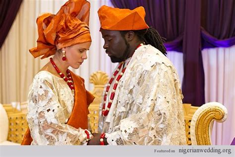 Nigerian Wedding Interracial Couple In Cream And Orange Aso Oke Photo